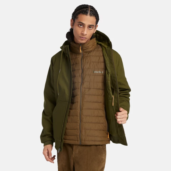 Jaqueta bomber masculina com capuz e isolamento térmico em lona verde.