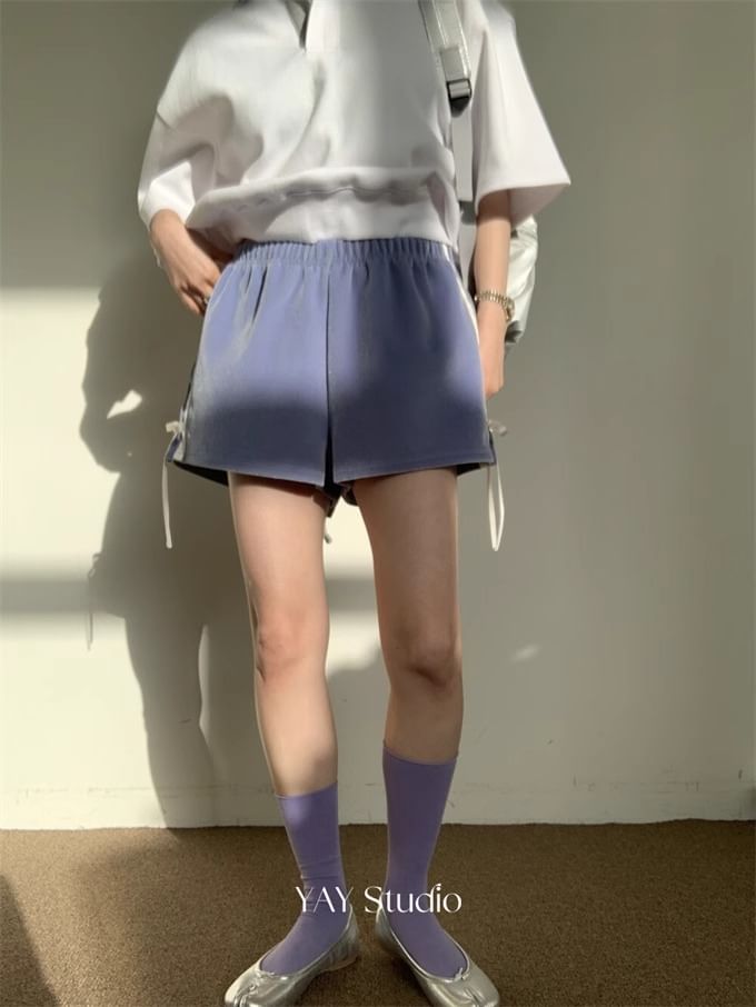 Alfie - Mid Rise gestreepte shorts met strik