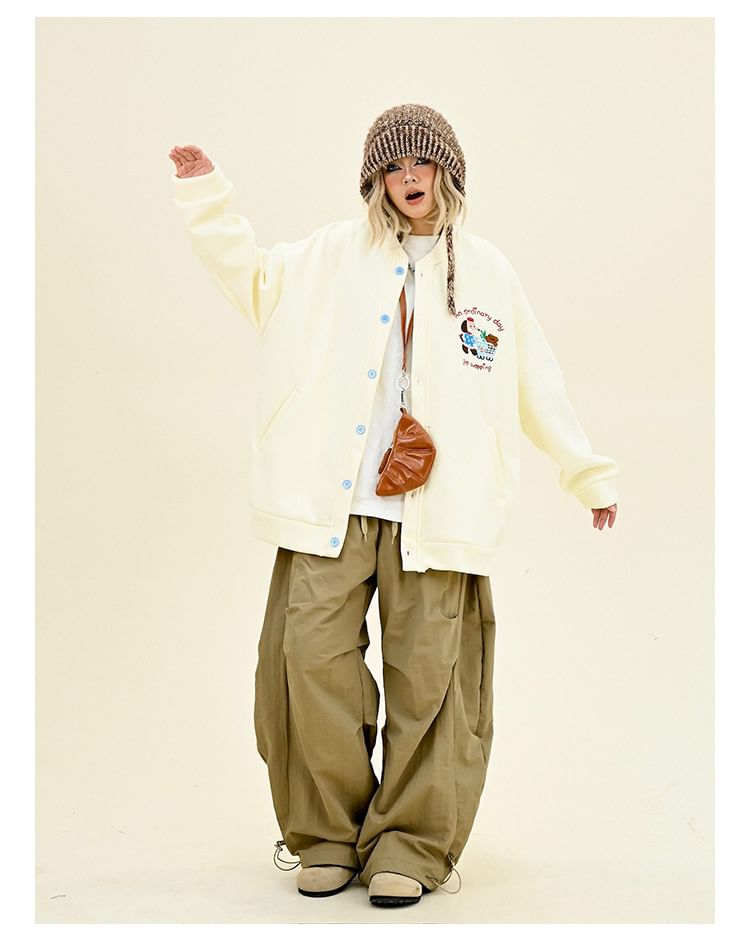 Iduna - Oversized baseballjack met geborduurde hondenhals en verlaagde schouders