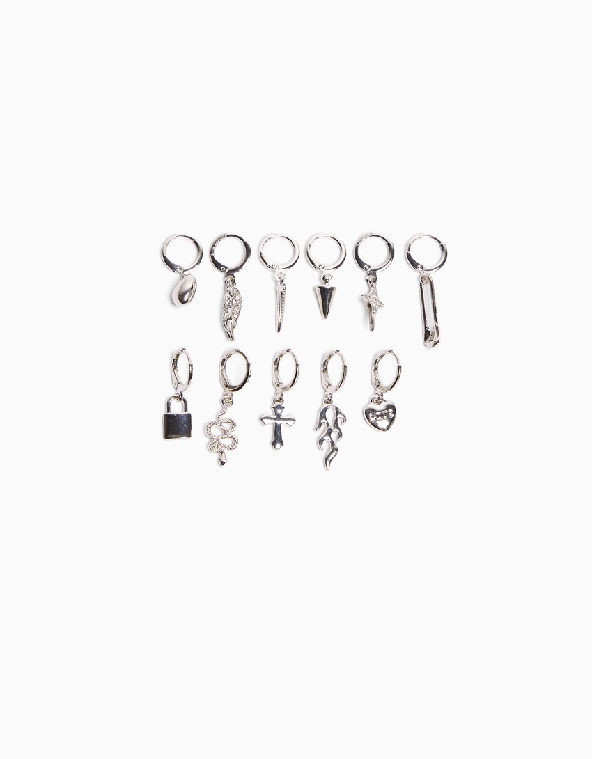Conjunto de 11 brincos de pressão com detalhes de cobra, cruz e espinhos.