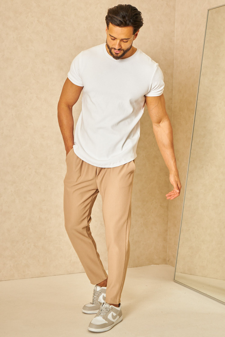 Pantalon de jogging fluide texturé à rayures beige