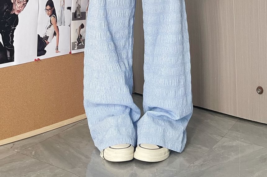 MELLO - Wijde broek met middelhoge taille en geborduurde kant en letters