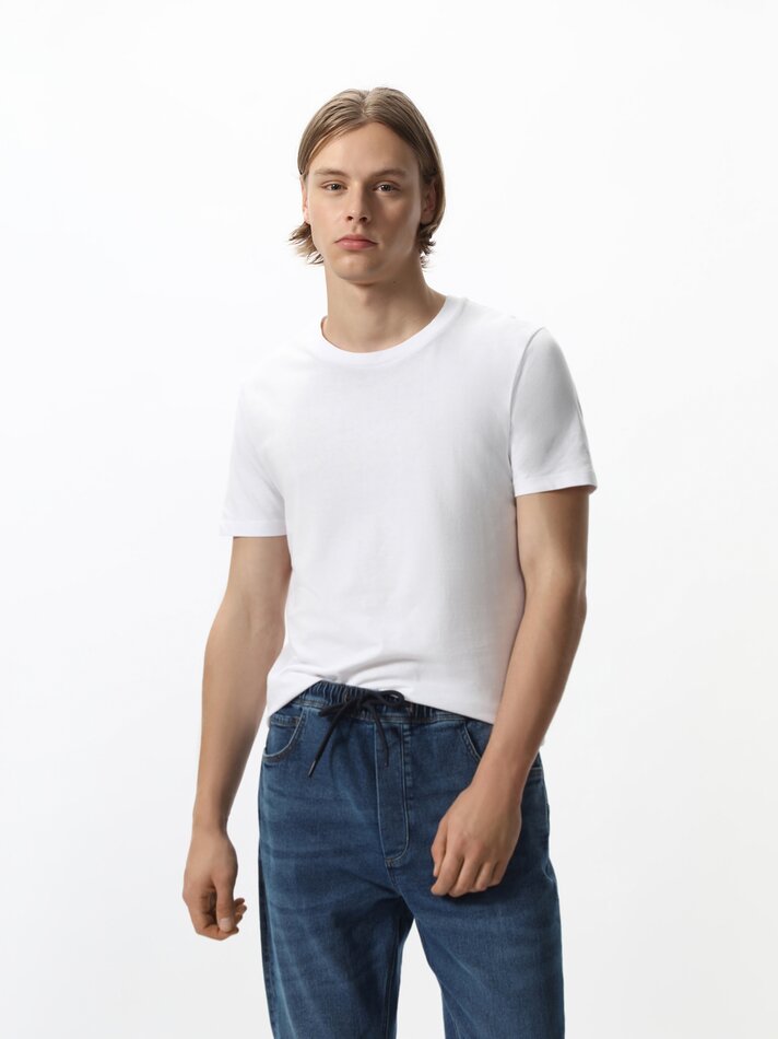 Calça jeans jogger elástica - Azul escuro