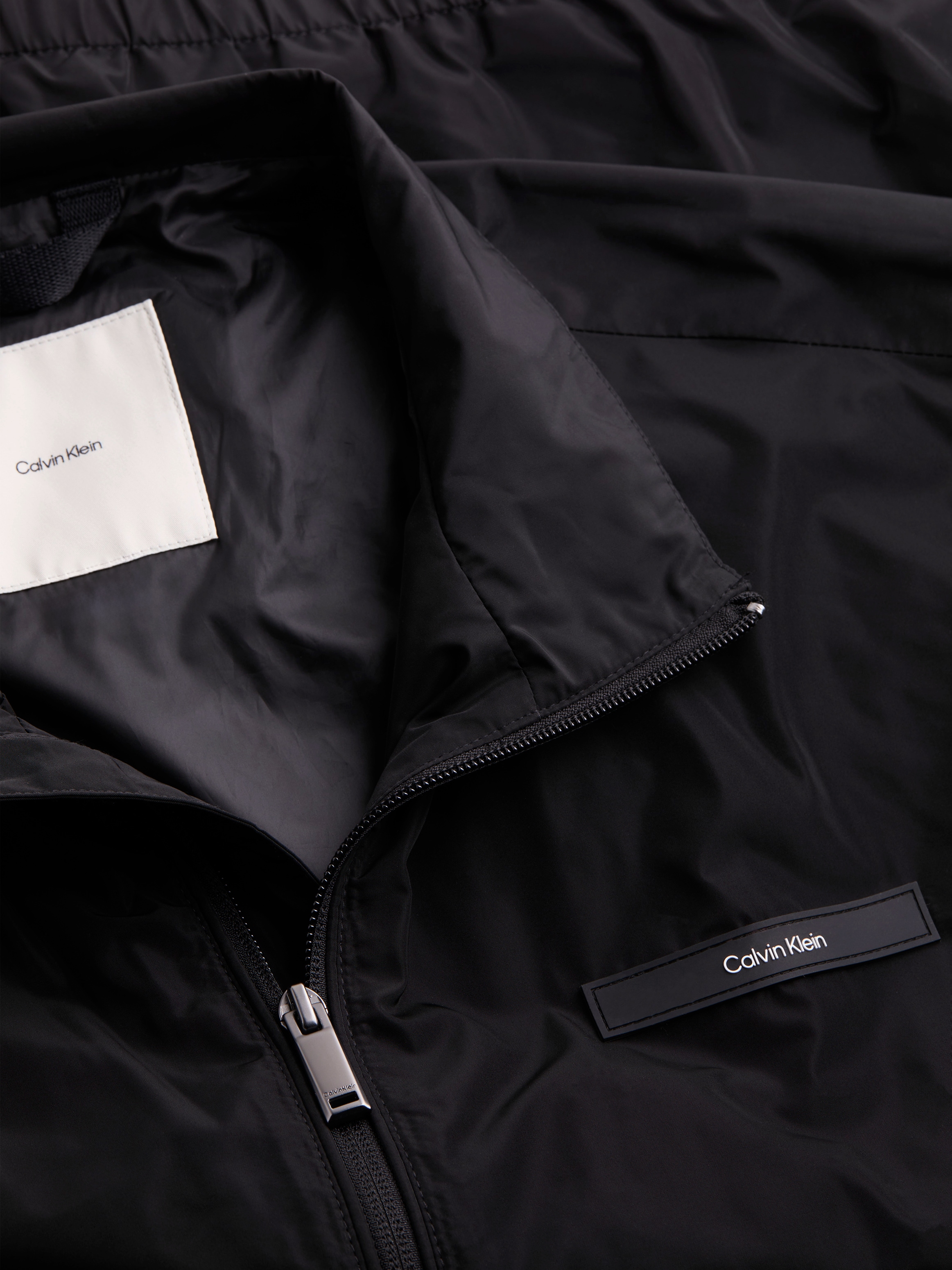 Calvin Klein Blouson »ESSENTIAL NYLON BLOUSON« mit Logo-Patch