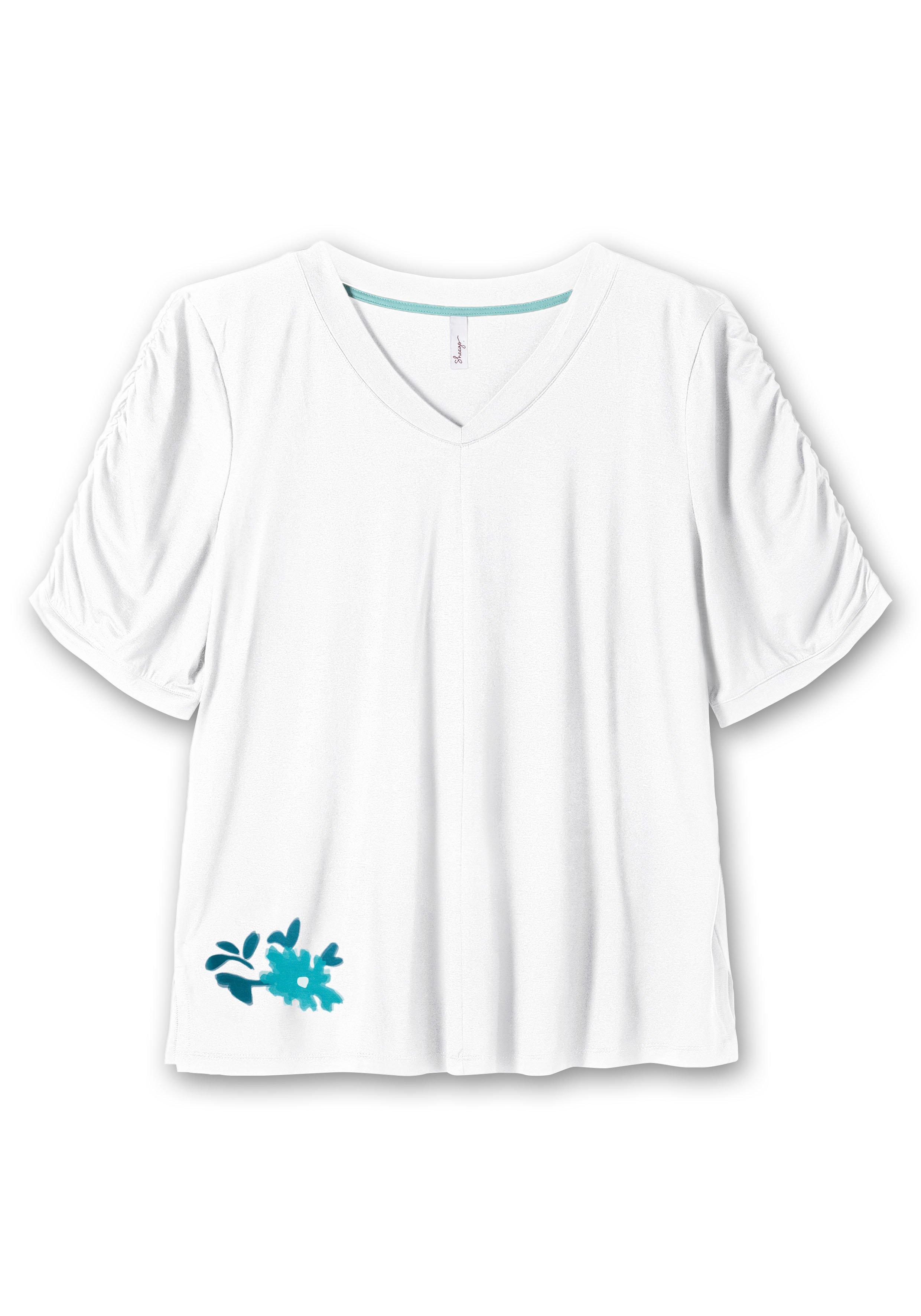 Shirt mit Blütenprint am Saum
