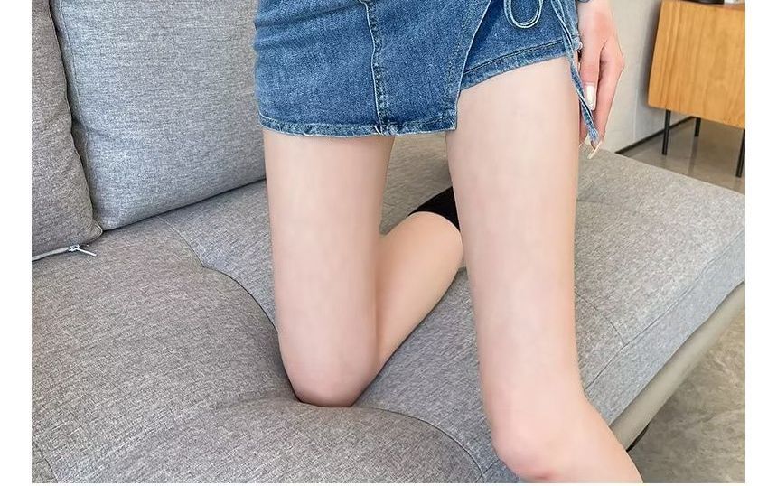 CosmoCorner - Asymmetrische denim skort met hoge taille en trekkoord
