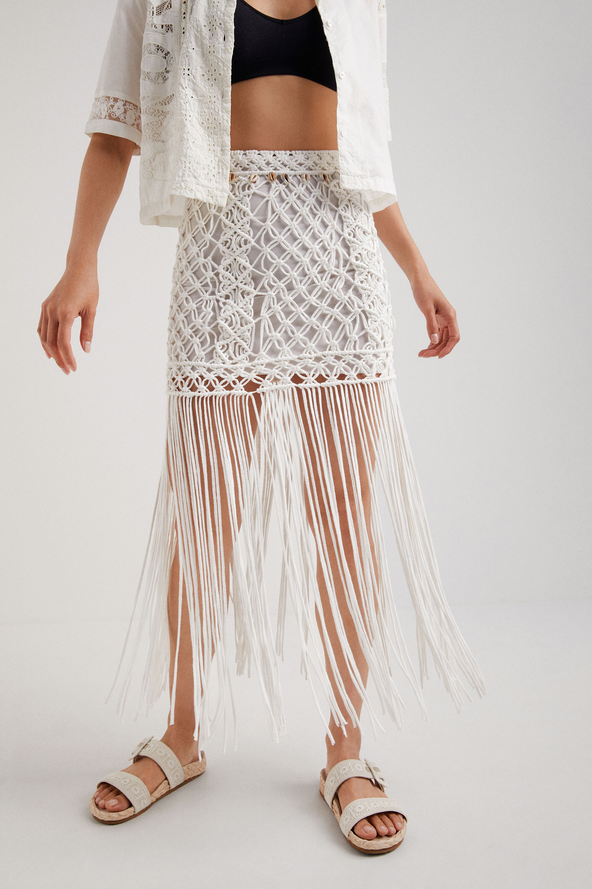 Mini-jupe en macramé à franges