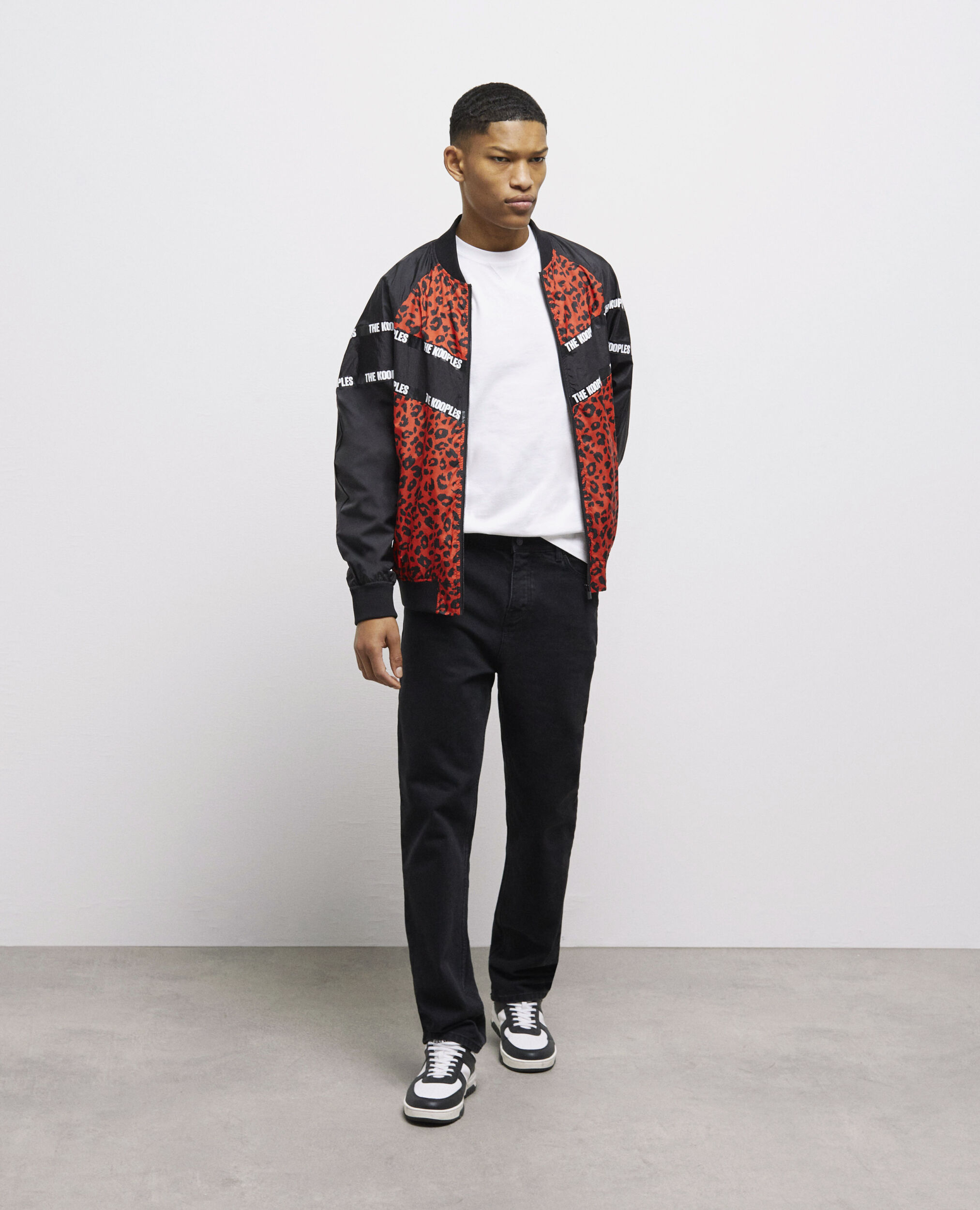 Blouson bicolore avec bandes logo
