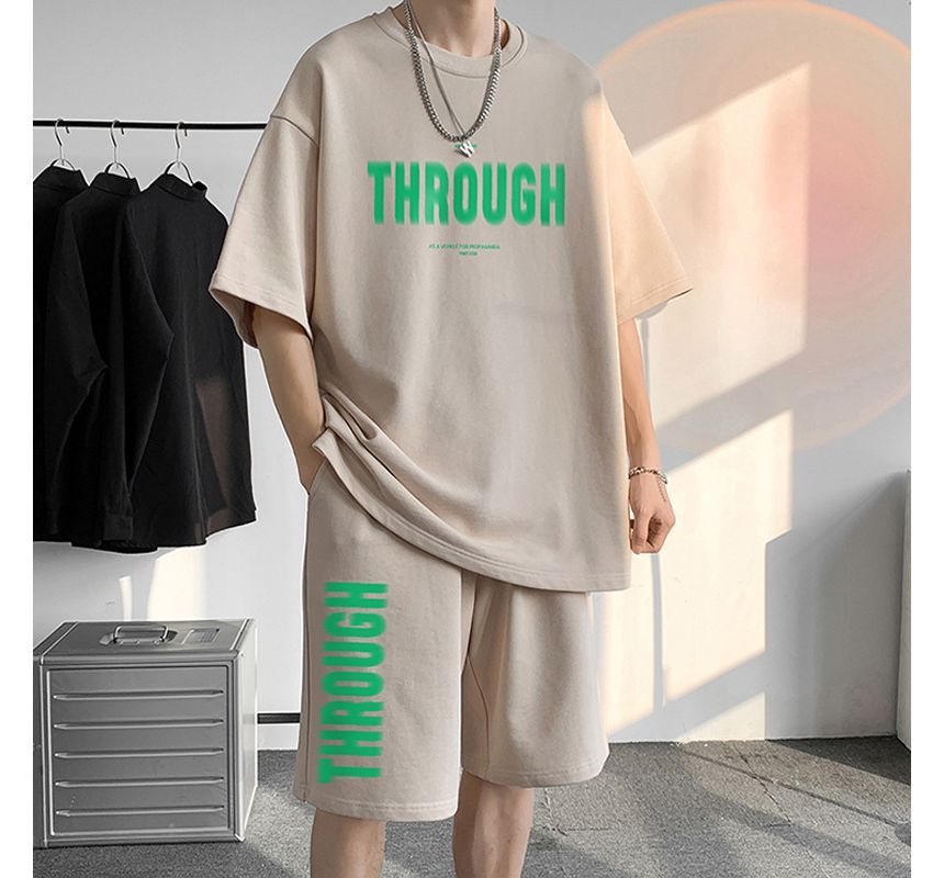 POSI - Set: T-shirt met korte mouwen en belettering + korte broek