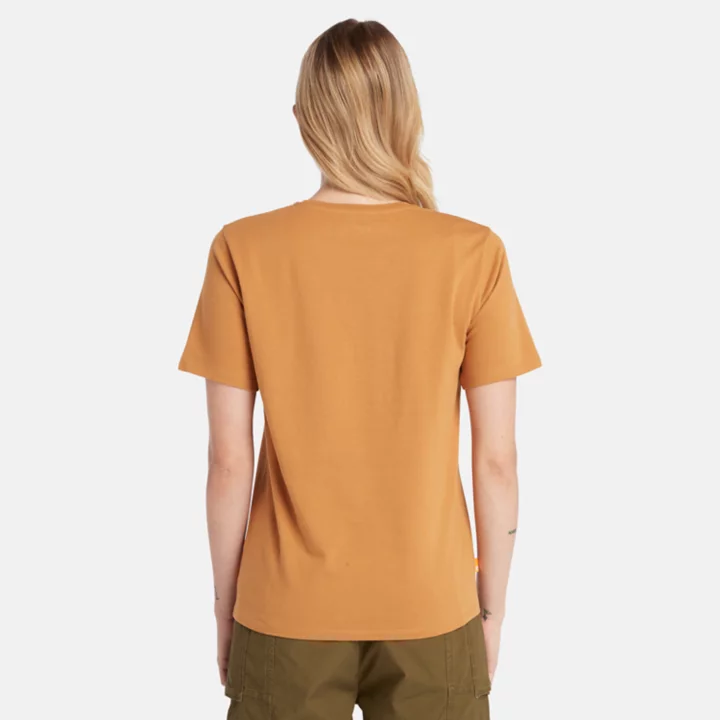 Camiseta feminina do Rio Exeter na cor amarelo escuro.