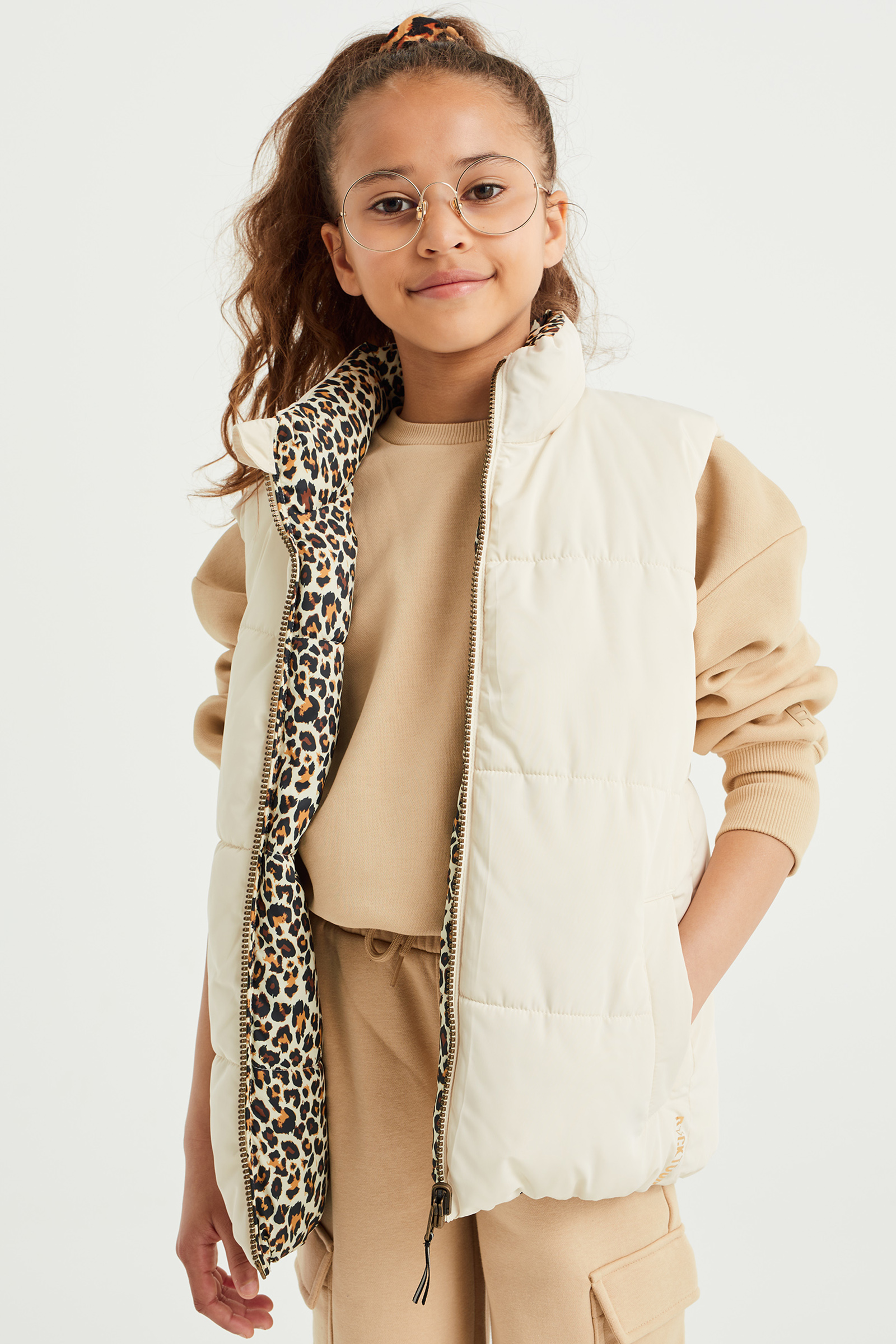 Meisjes reversible bodywarmer met dessin WE Fashion Gebroken wit