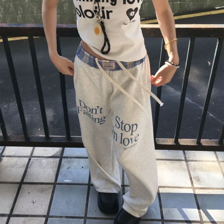 Jerolenea - Trekkoord taille met letterprint, geruit paneel en wijde pijpen, joggingbroek