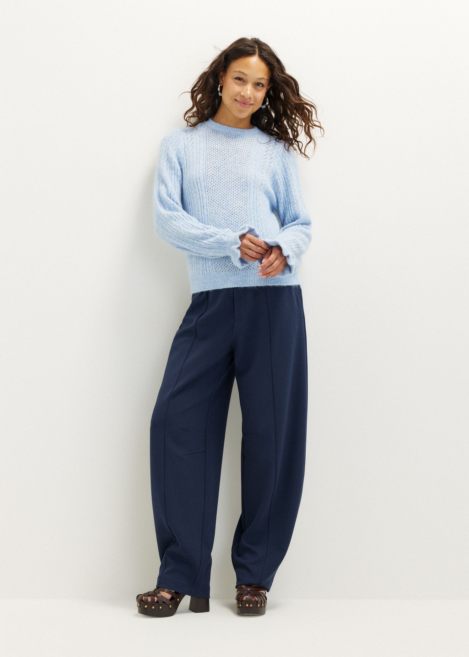 Gebreide trui met ruffles