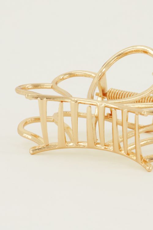 Goudkleurige schelp haarclip