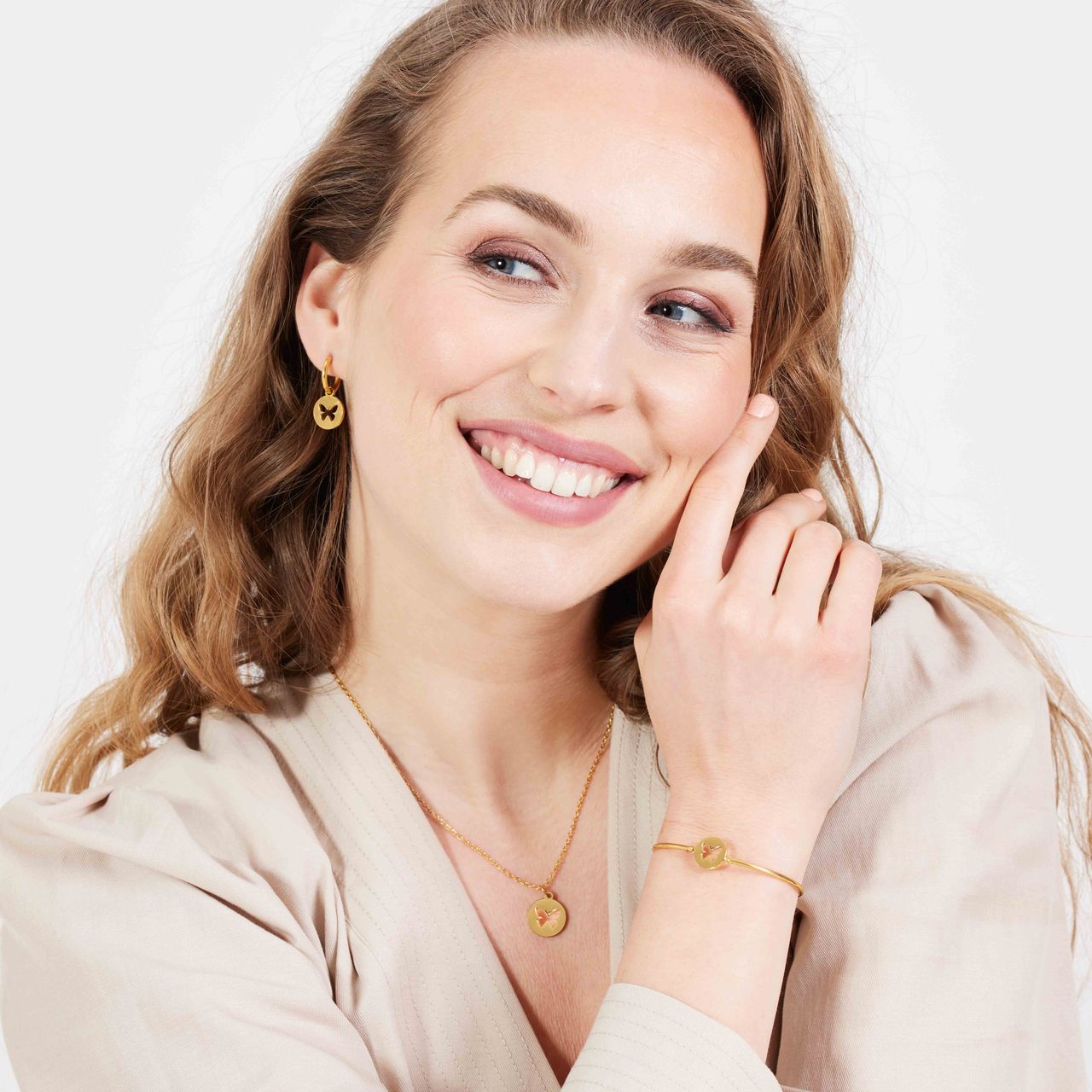 Stalen goldplated oorbellen met vlinder