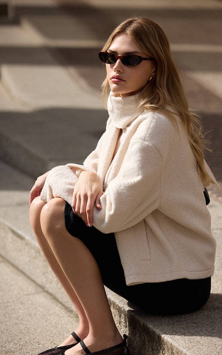 Crème Manteau Bouclé À Col Écharpe