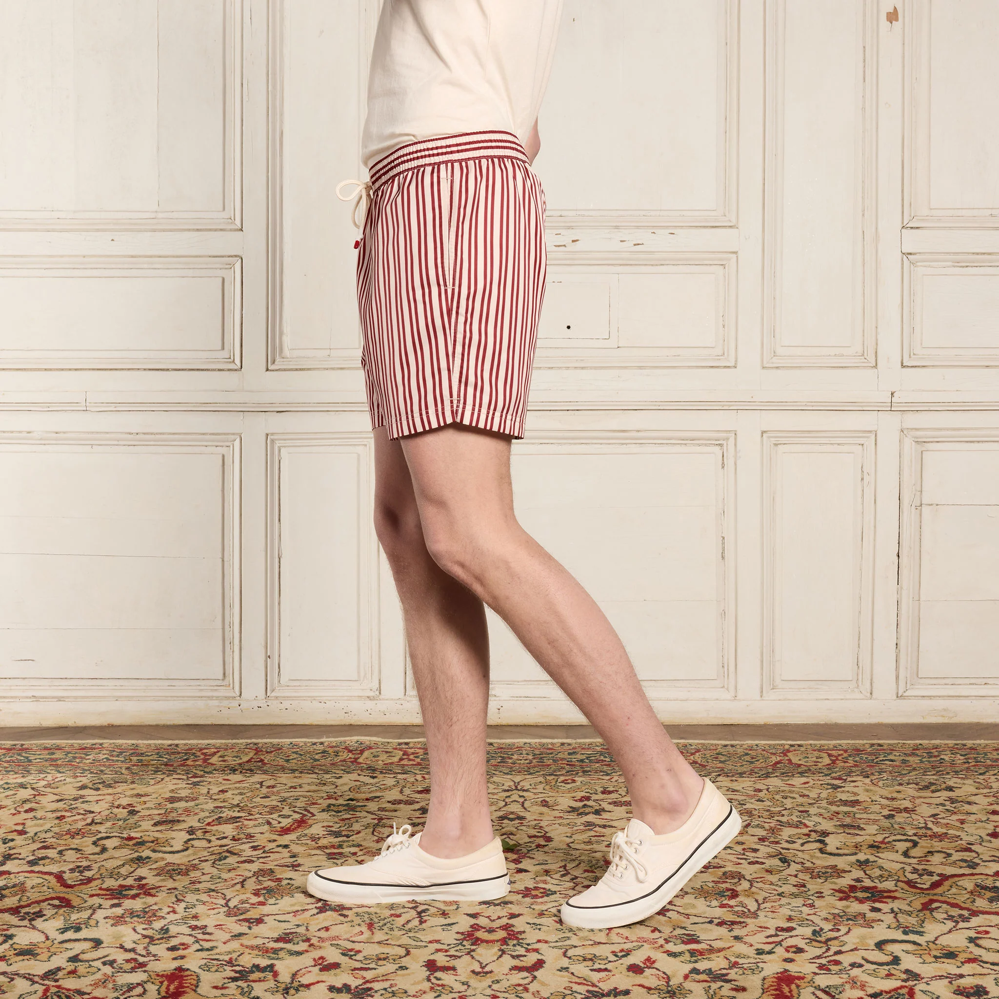 Ecru swimsuit with burgundy stripes