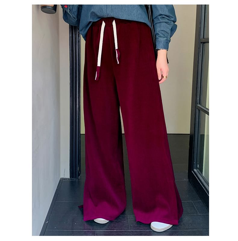 Tripoly - Plus-size broek met trekkoord in de taille en wijde pijpen