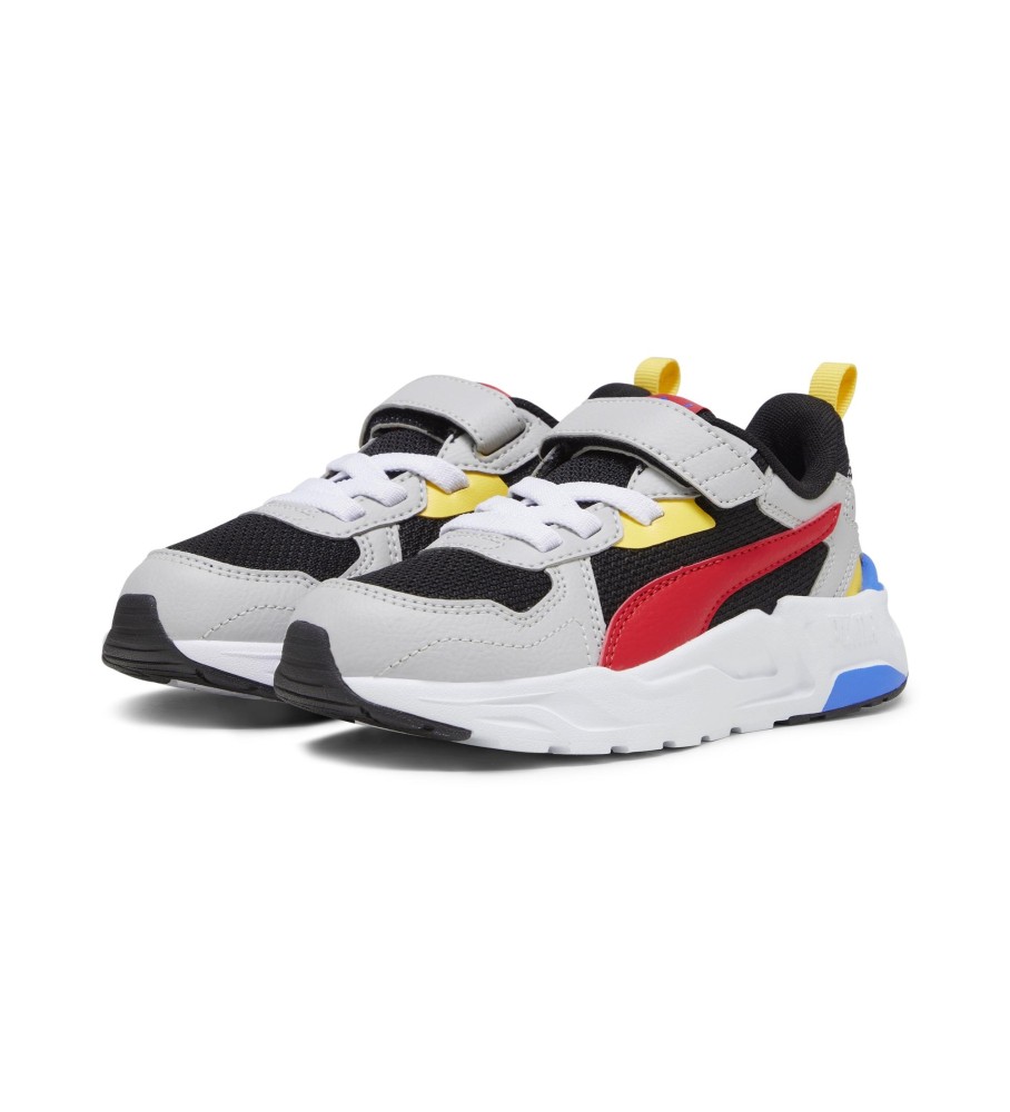 Tênis Puma Trinity Lite de couro, cinza e vermelho.