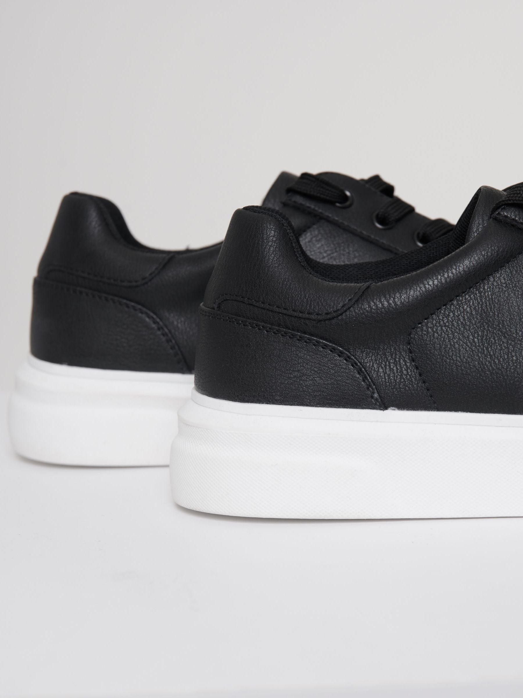 Threadbare Court Trainers