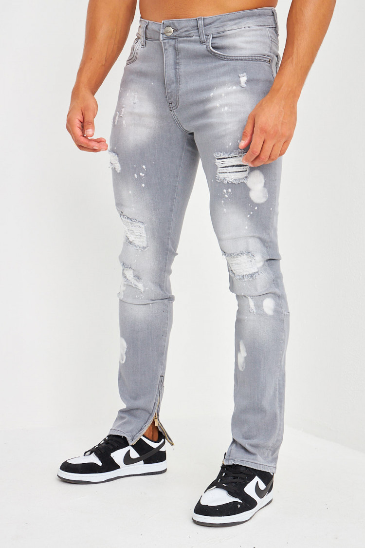 Jeans slim gris zippé, taché et déchiré