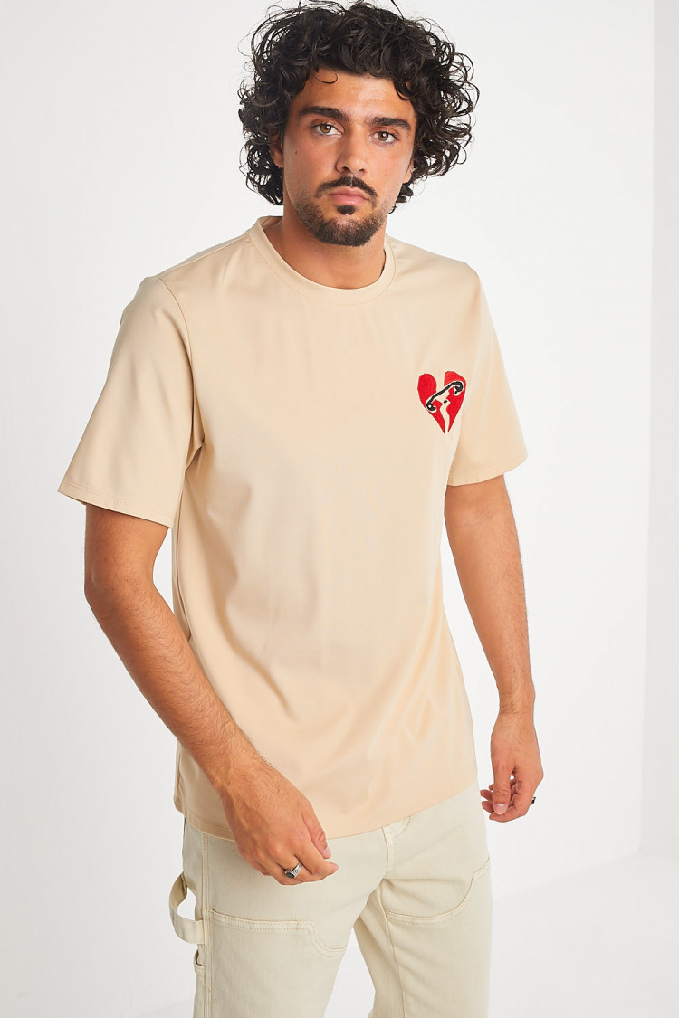 T-shirt beige coeur brisé