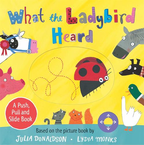 What the Ladybird Heard: A Push, Pull and Slide Board Book (Board book)