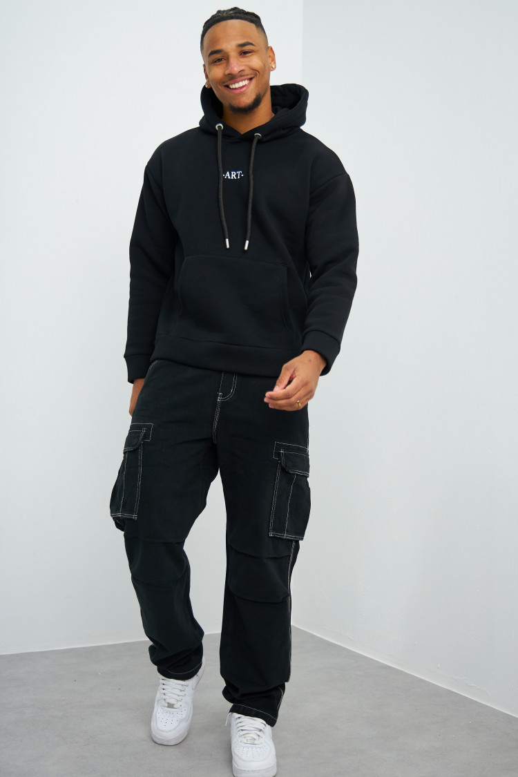 Jean cargo noir à couture blanche