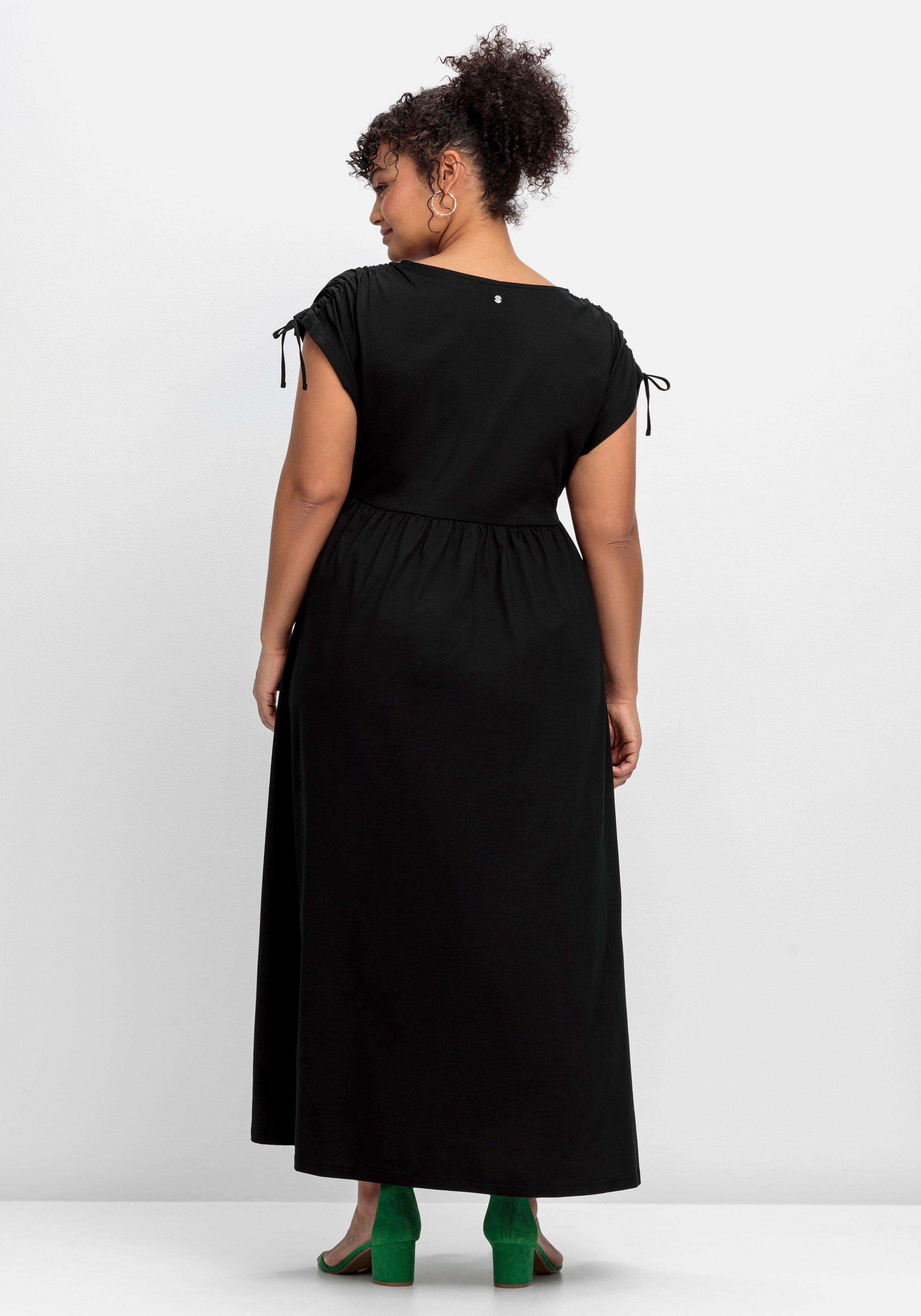 Jerseykleid mit weitem Rock und V-Ausschnitt