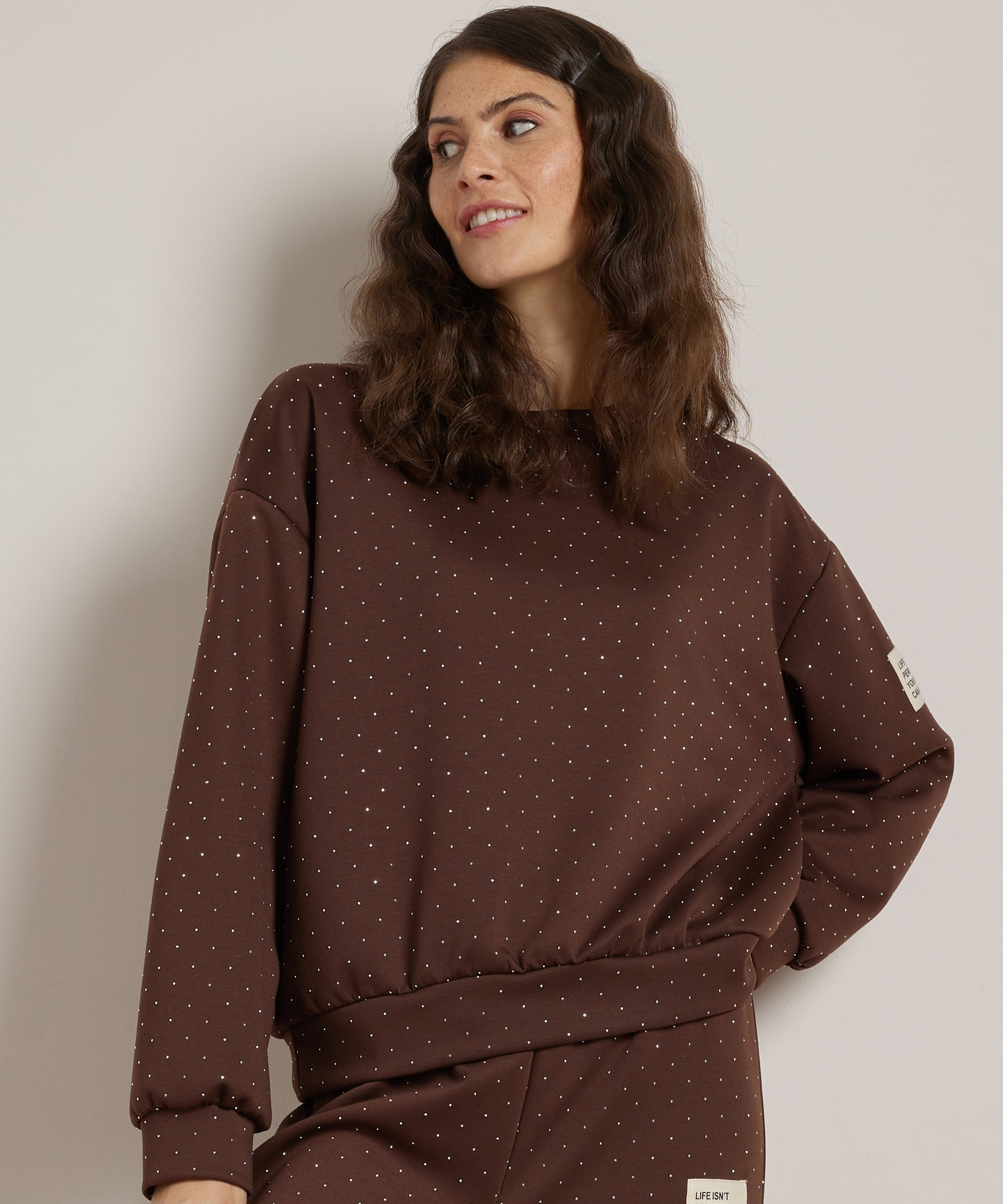 glitter trui mouwlabel