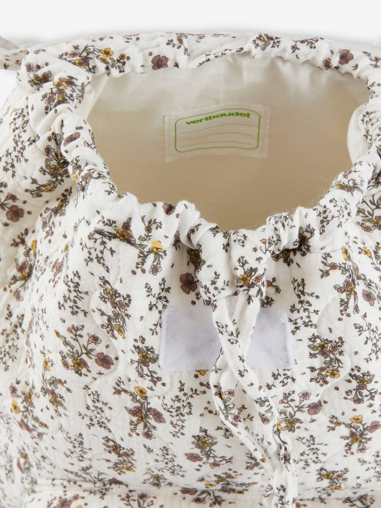Mochila estampada com flores bege claro