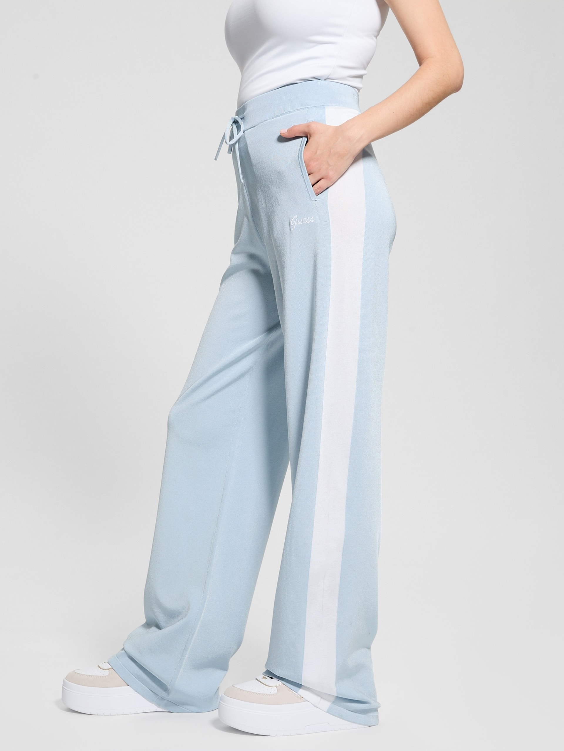 Calça de malha listrada