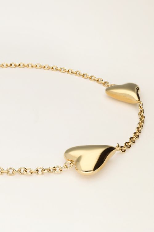 Statement ketting met hartjes