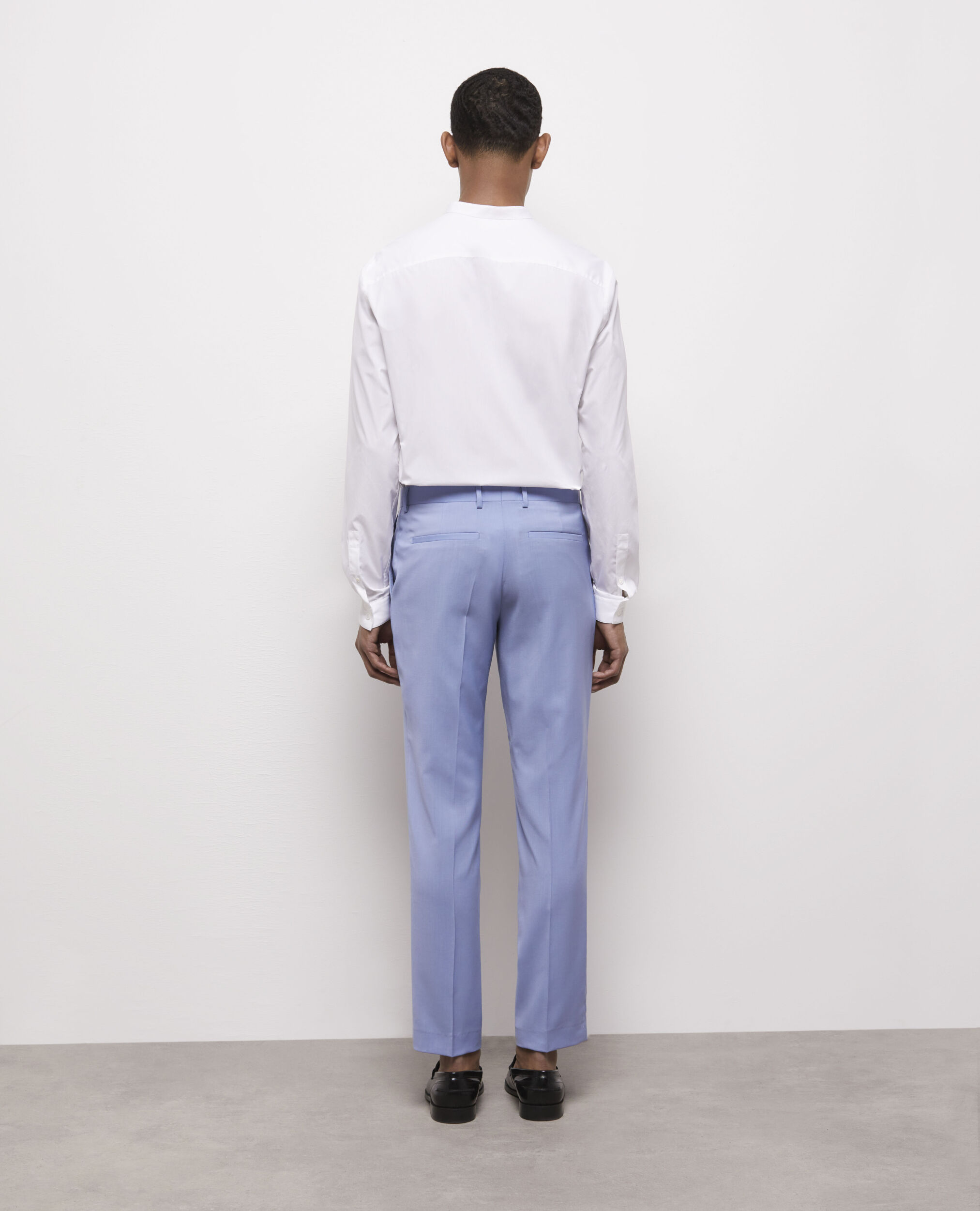 Pantalon de costume bleu en laine fil à fil