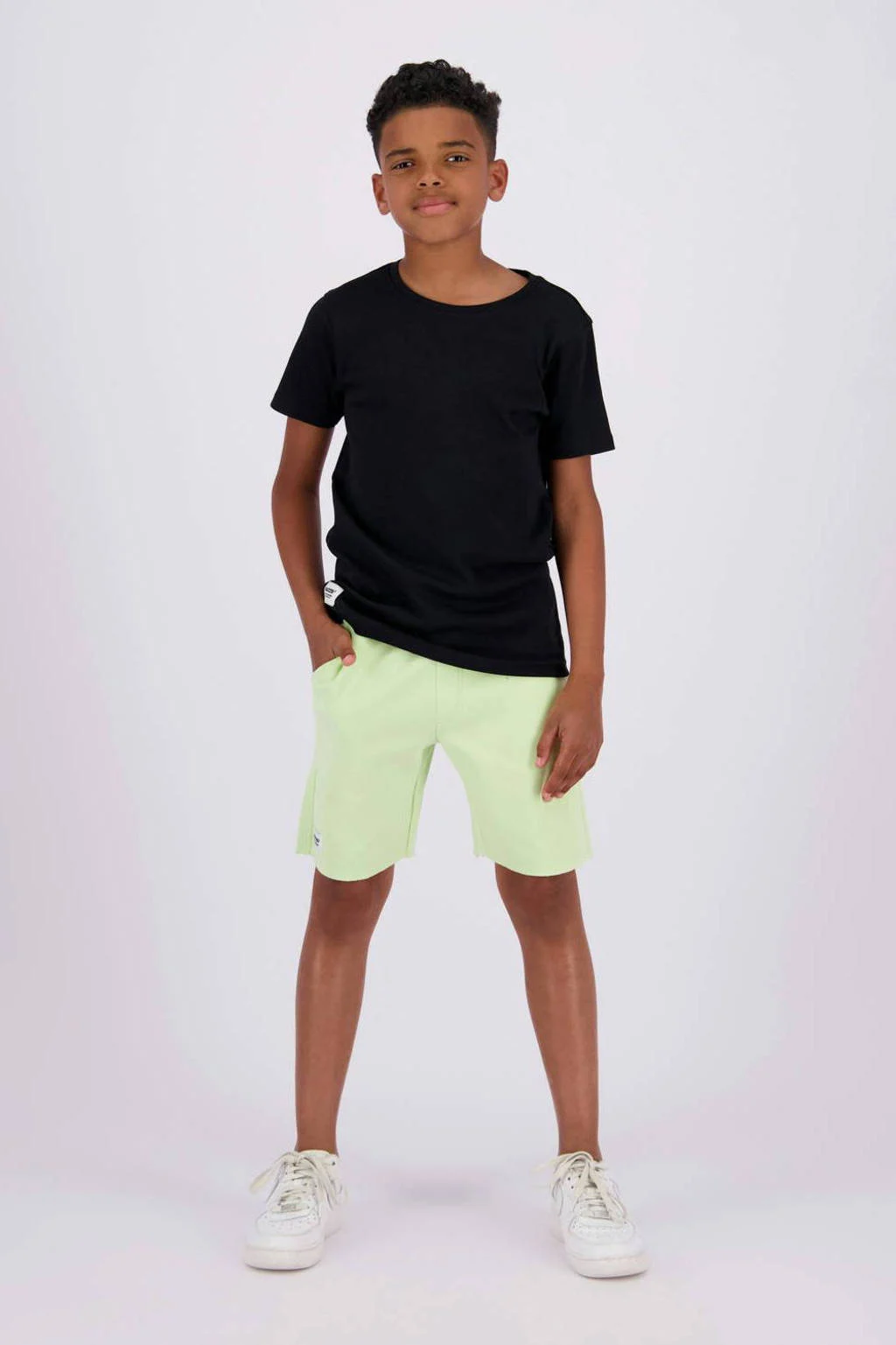 Raizzed sweatshort Rosh met logo licht limegeel