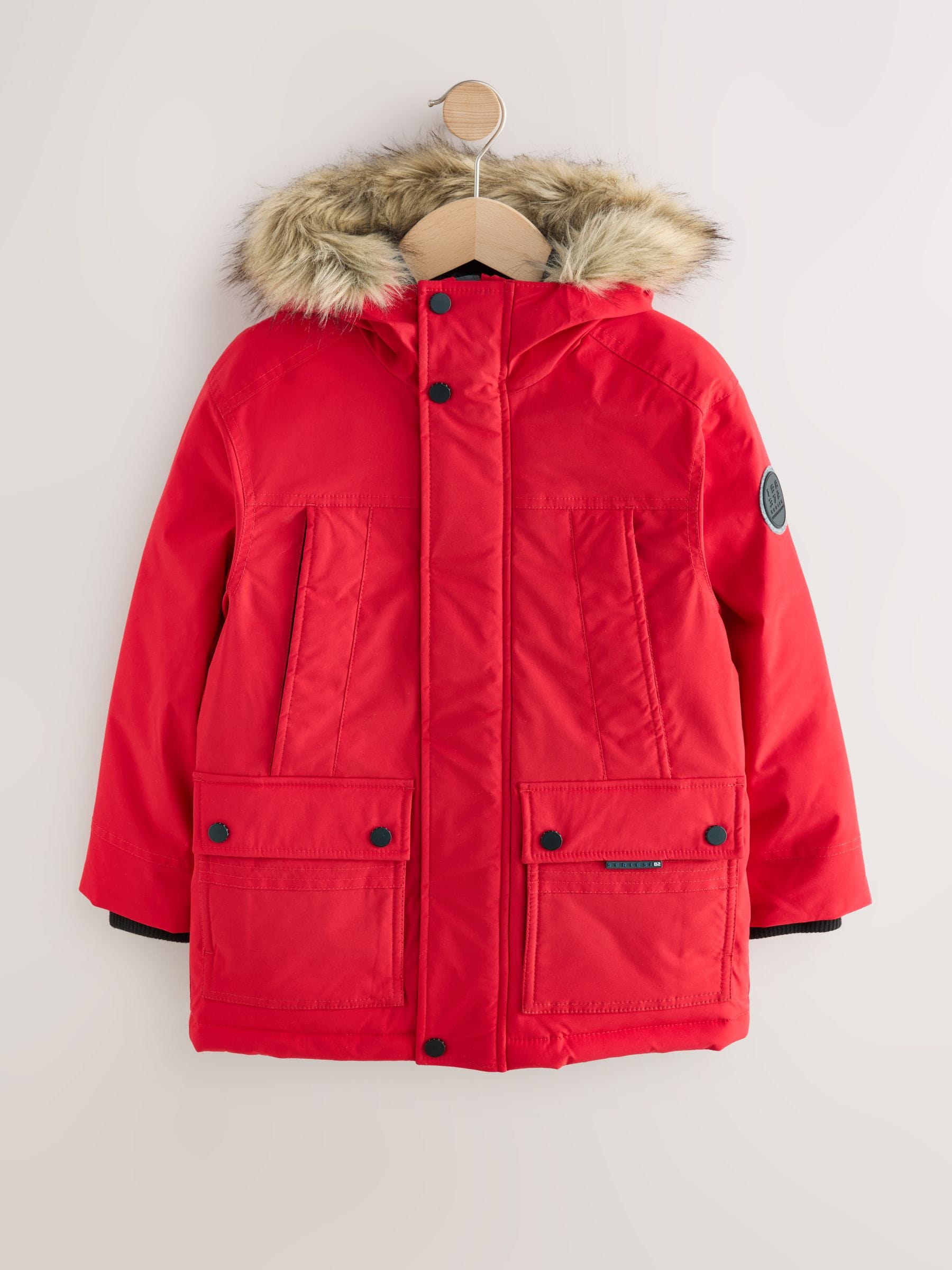 Rood - Zware regenbestendige parka met imitatiebontrand (3-16jr)