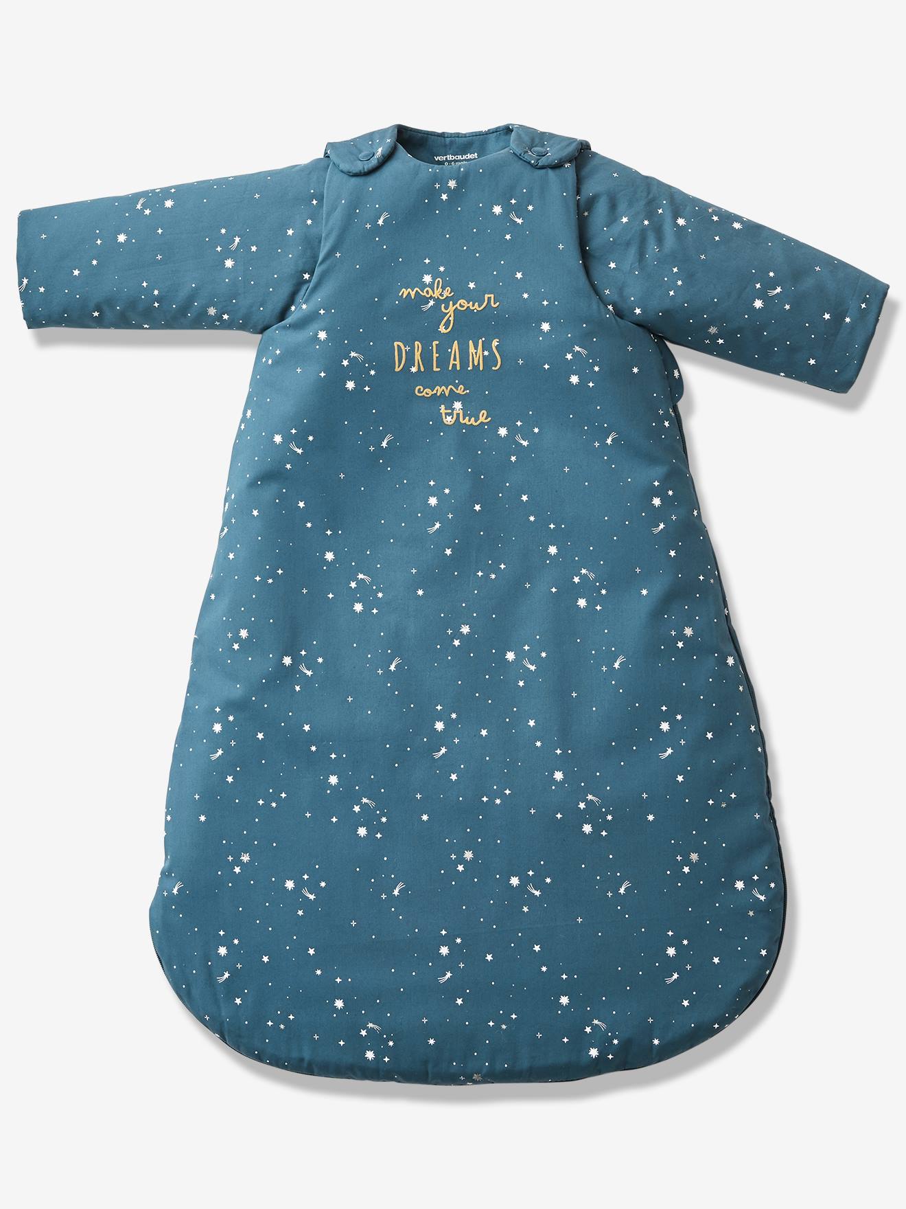 Saco de dormir liso azul escuro com estampa de urso polar e mangas removíveis.