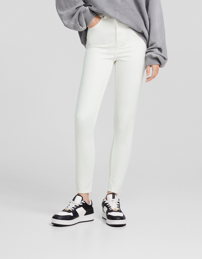 calça jeans skinny de cintura super alta