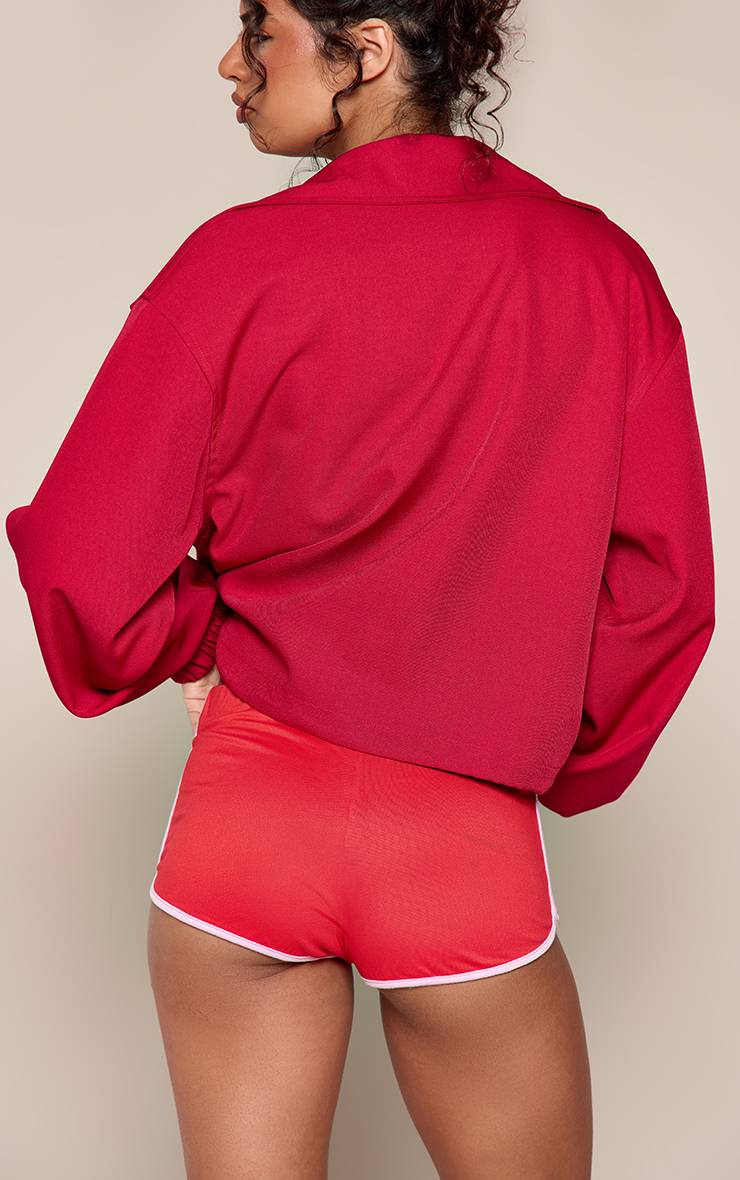 Rouge Short Moulant En Jersey Avec Bordure Contrastante