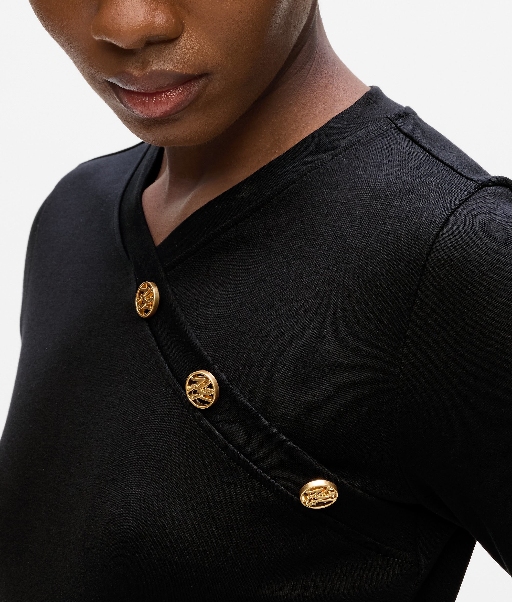 T-shirt met lange mouwen en knoopdetail