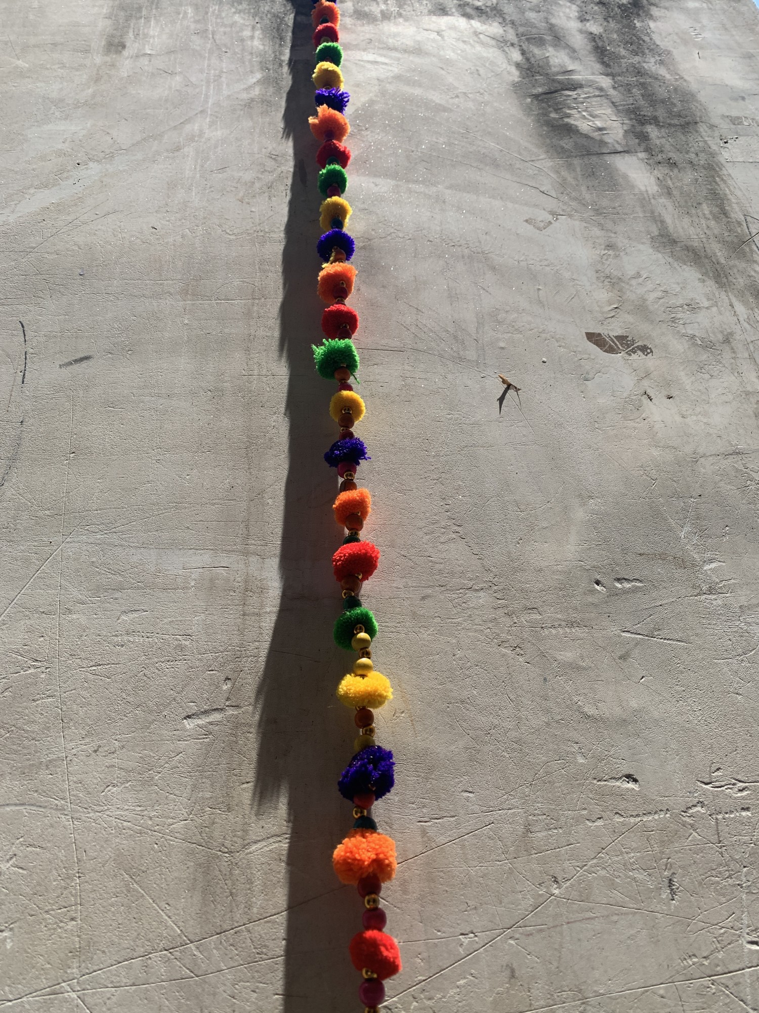 Pompom-Kette mit Glöckchen, multicolor, 100 cm von fischer's lagerhaus