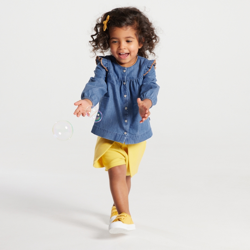 Blouse denim à volants bleue bébé fille