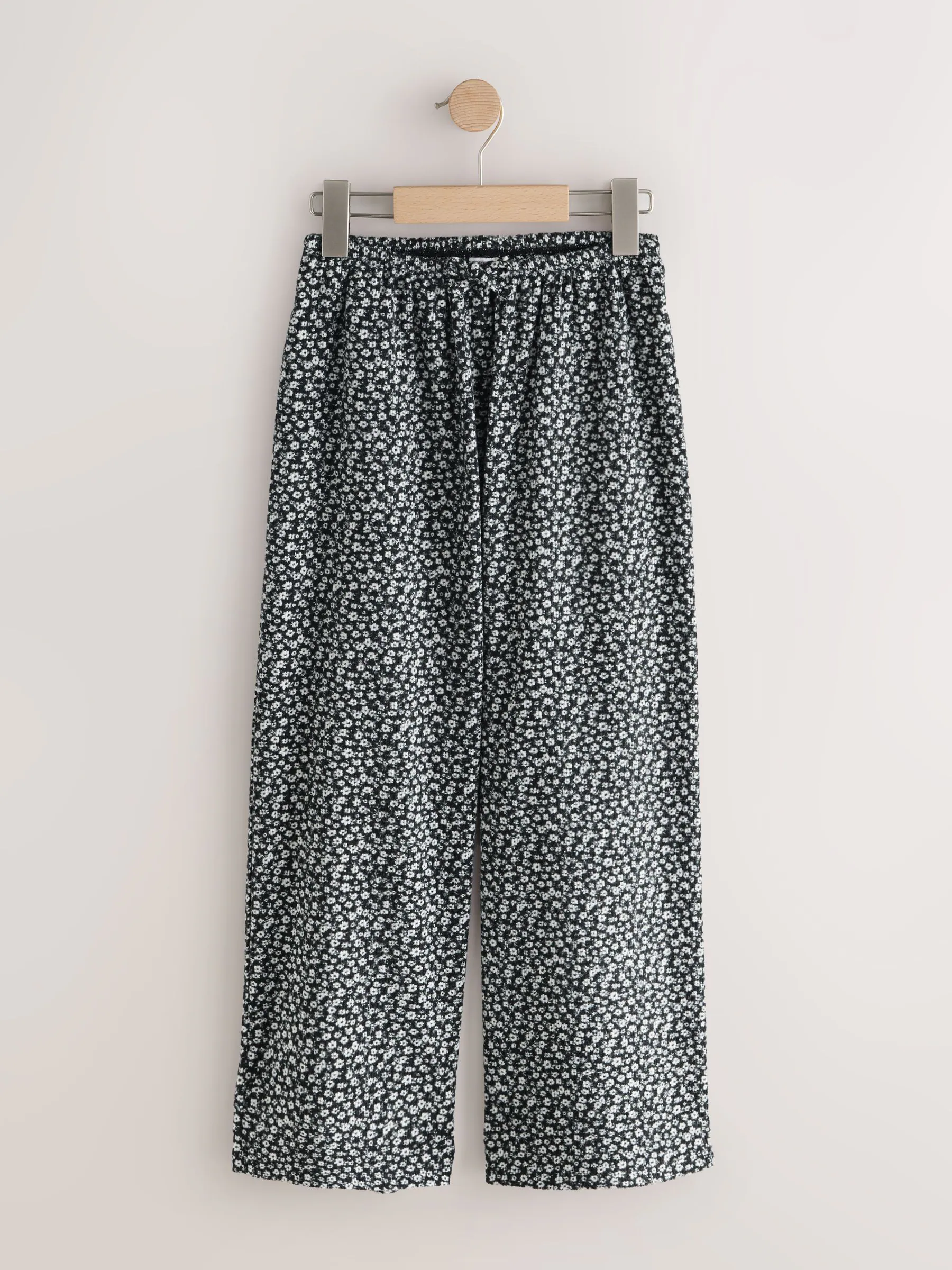 Zwart/wit met bloemenprint - Broek met wijde pijpen (3-16 jr)