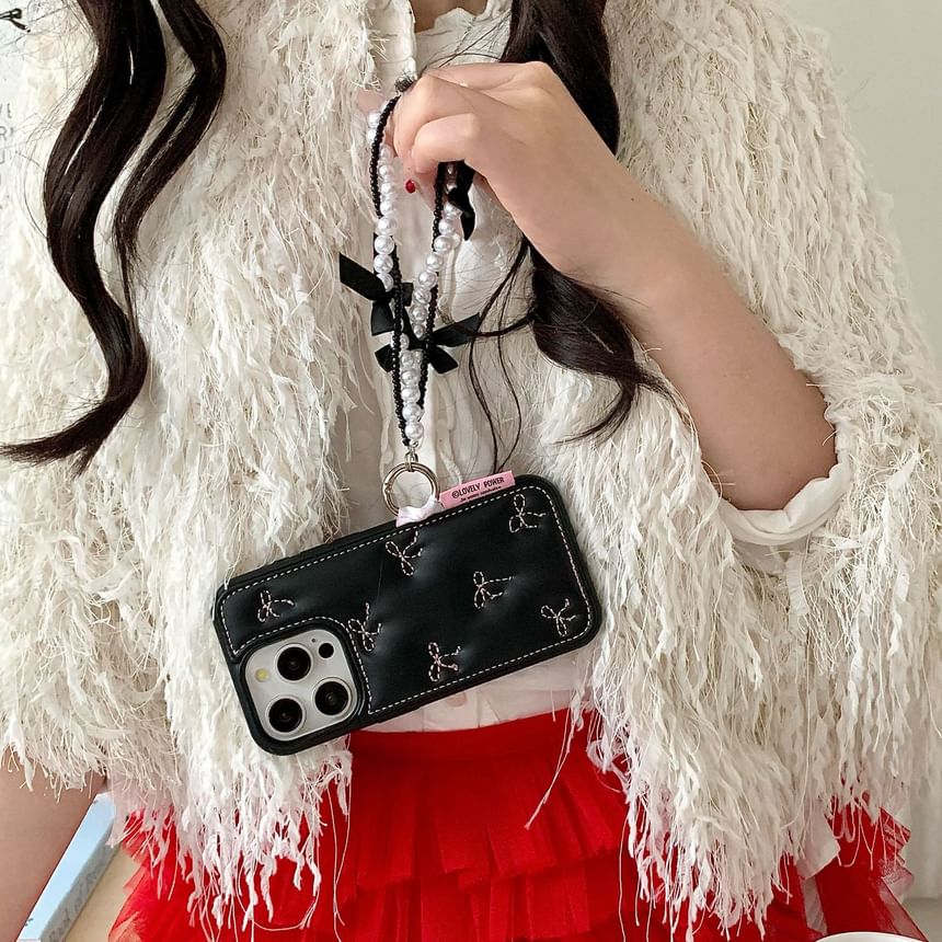 Vachie - Telefoonhoesje met strikborduurwerk / Bandje van imitatieparels / Set - iPhone 16 Pro Max / 16 Pro / 16 Plus / 16 / 15 Pro Max / 15 Pro / 15 Plus / 15 / 14 Pro Max / 14 Pro / 14 Plus / 14 / 13 Pro Max / 13 Pro / 13 / 13 Mini