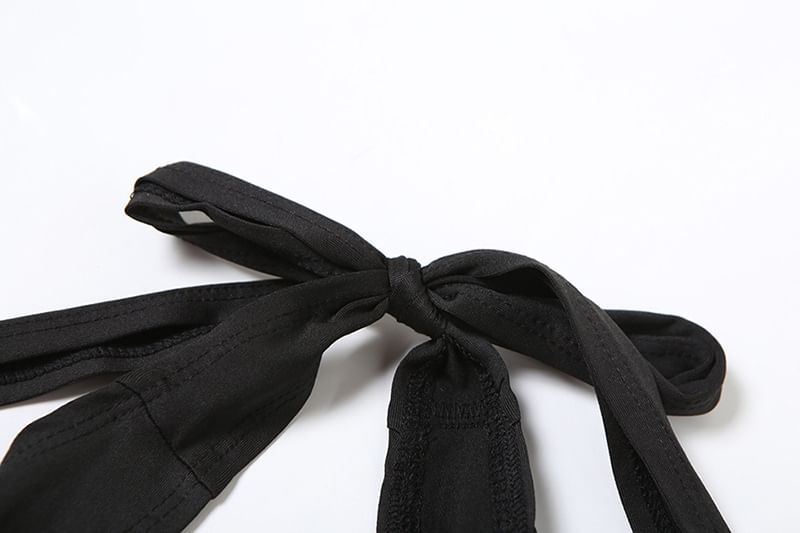 Weaveal - Mouwloze jumpsuit met open rug en effen stof