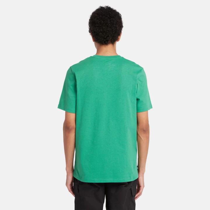Camiseta masculina verde da equipe Est. 1973.