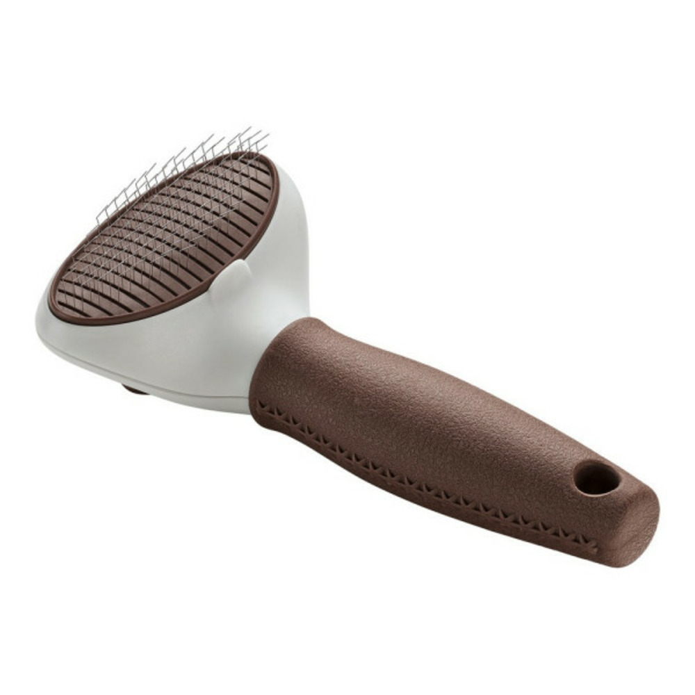 Brosse pour carder auto-nettoyant