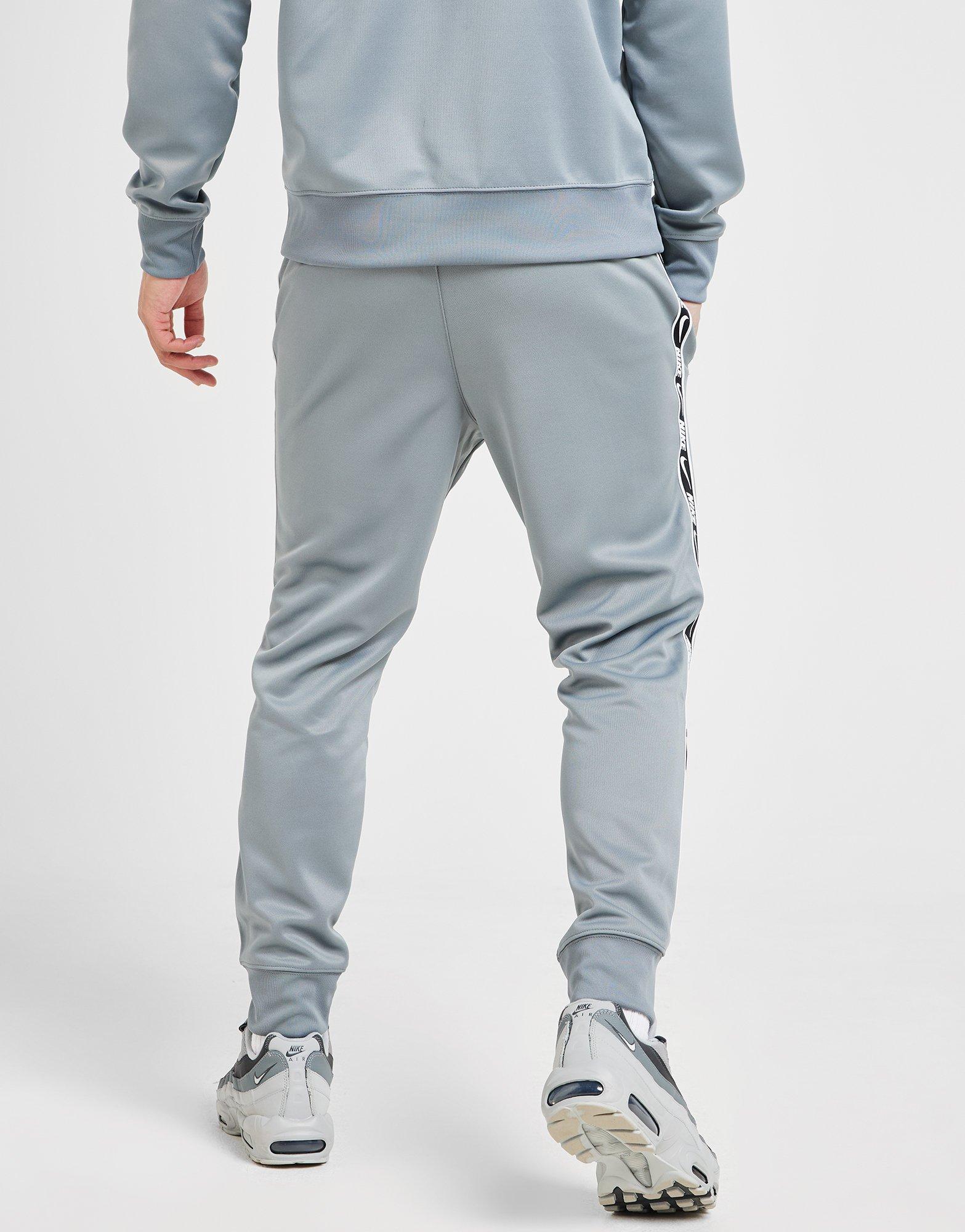 Nike Pantalon de survêtement Tape Polyknit