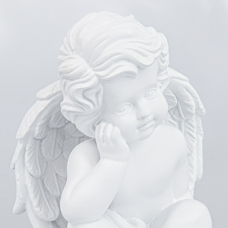 Figurine ange assis blanc