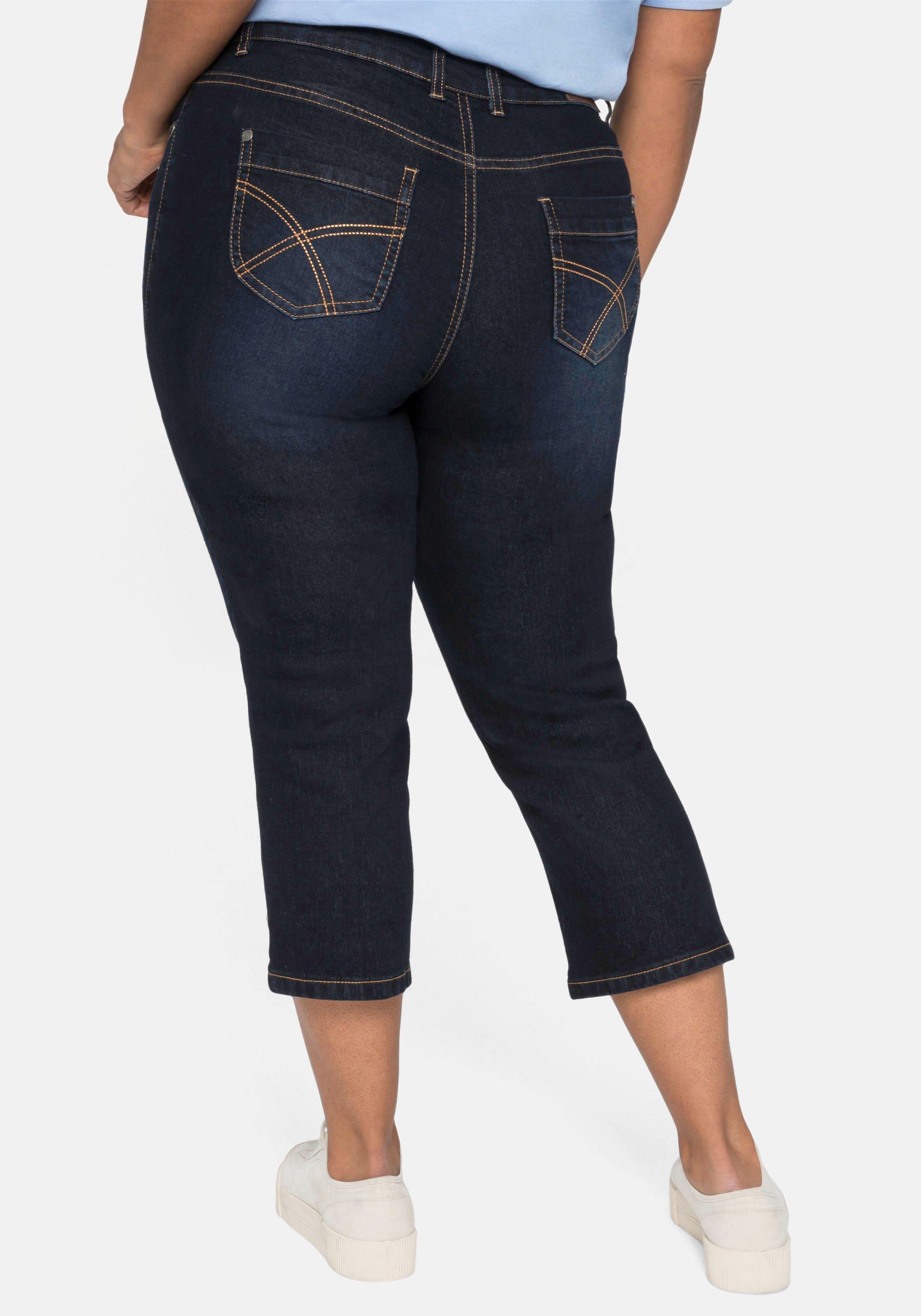 Caprijeans mit Kontrastnähten und Catfaces
